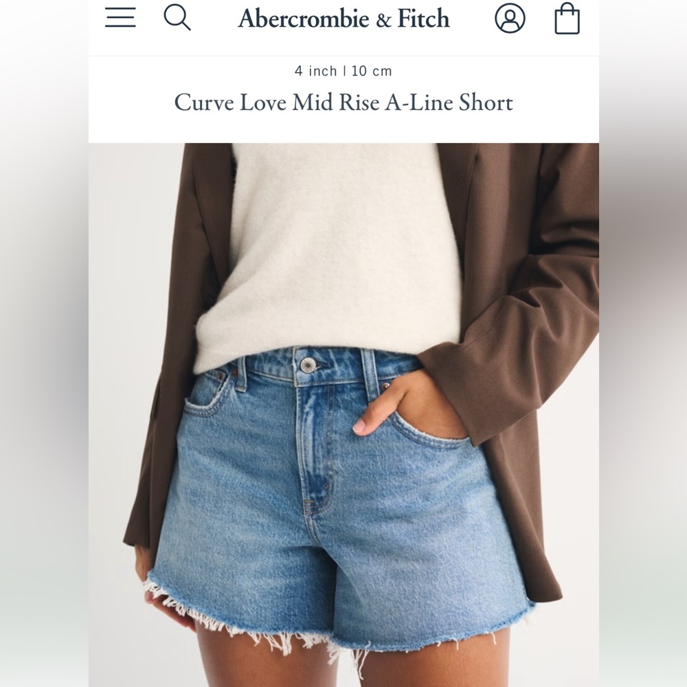 BESTSELLER! Abercrombie Curve Love Mid Rise A-Line Short in medium wash.